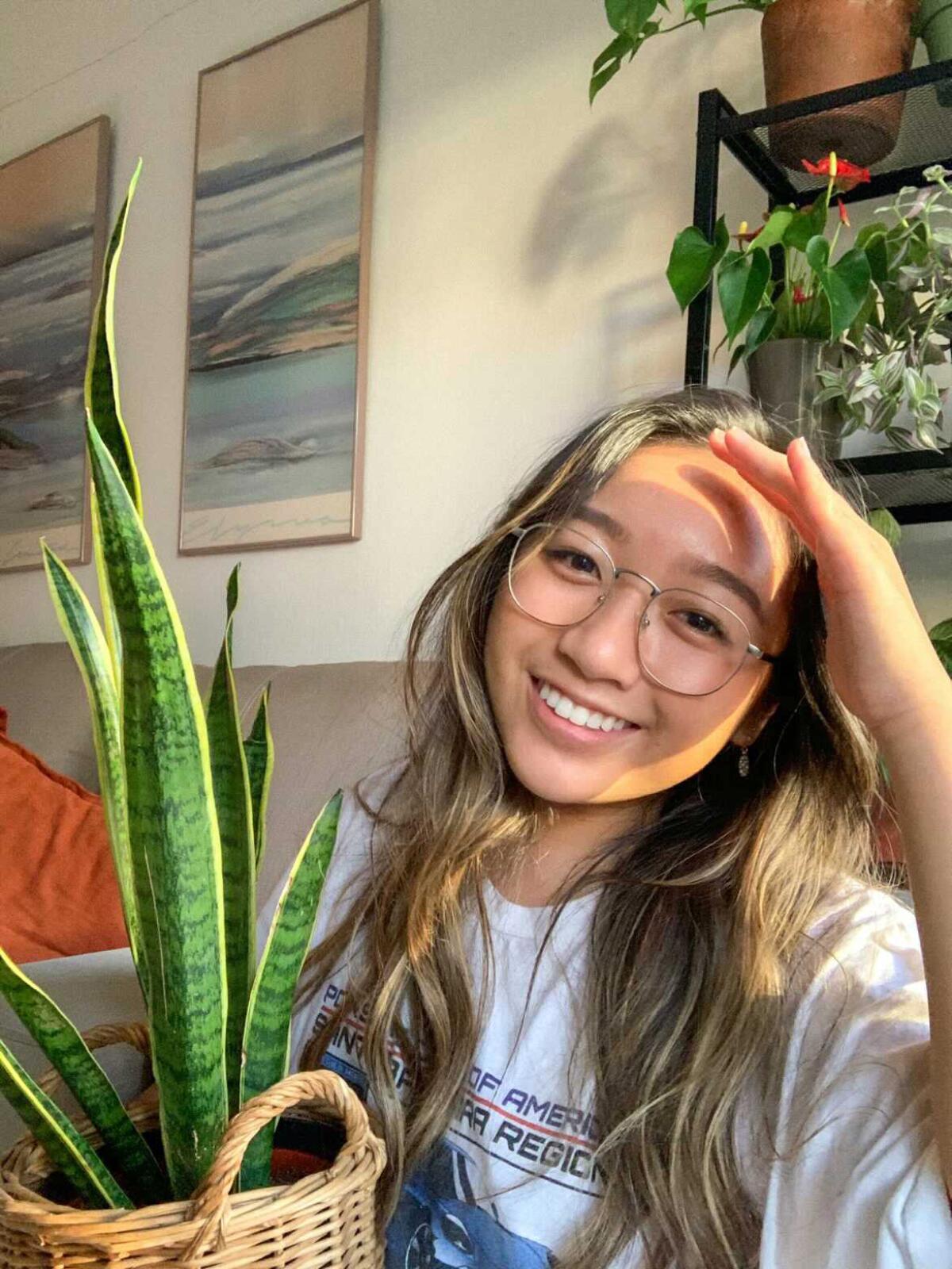 Reader Michelle Tran with a snake plant