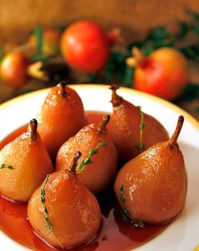 Pears in pomegranate wine, with honey and thyme.