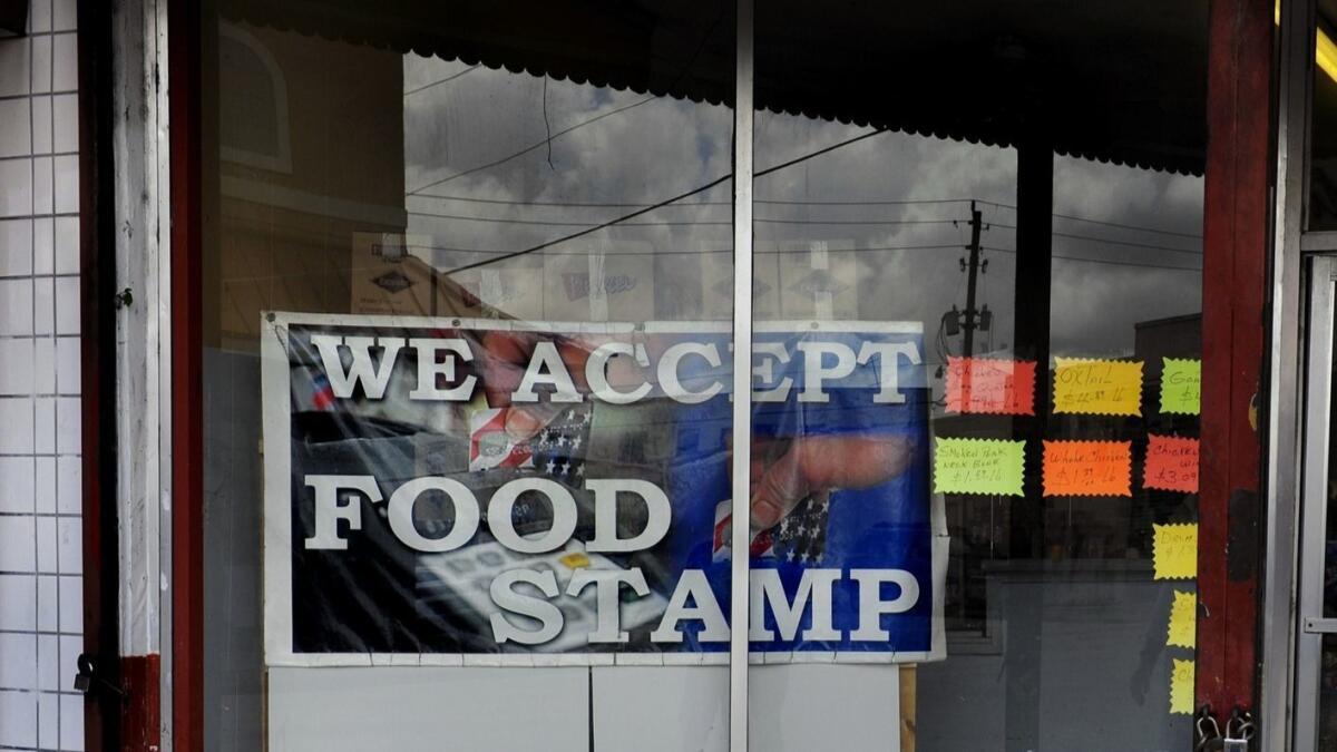 A business in Belle Glade, Fla., offers shoppers the opportunity to use food stamps as part of the federal SNAP program.