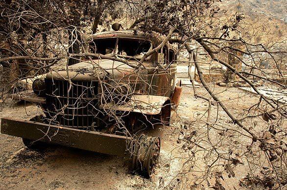 Charred remains of a vintage vehicle that was destroyed when the Station fire swept through the Delta Flat area of Tujunga.