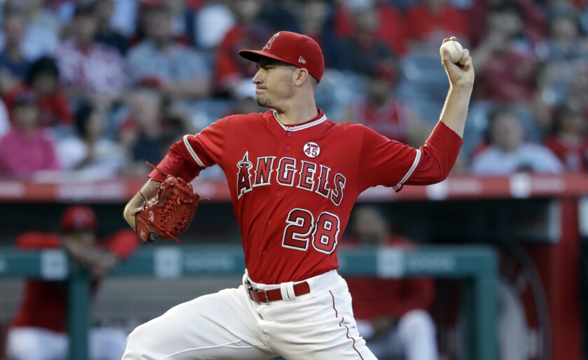 Angels starter Andrew Heaney throws a pitch against the Astros on July 16.