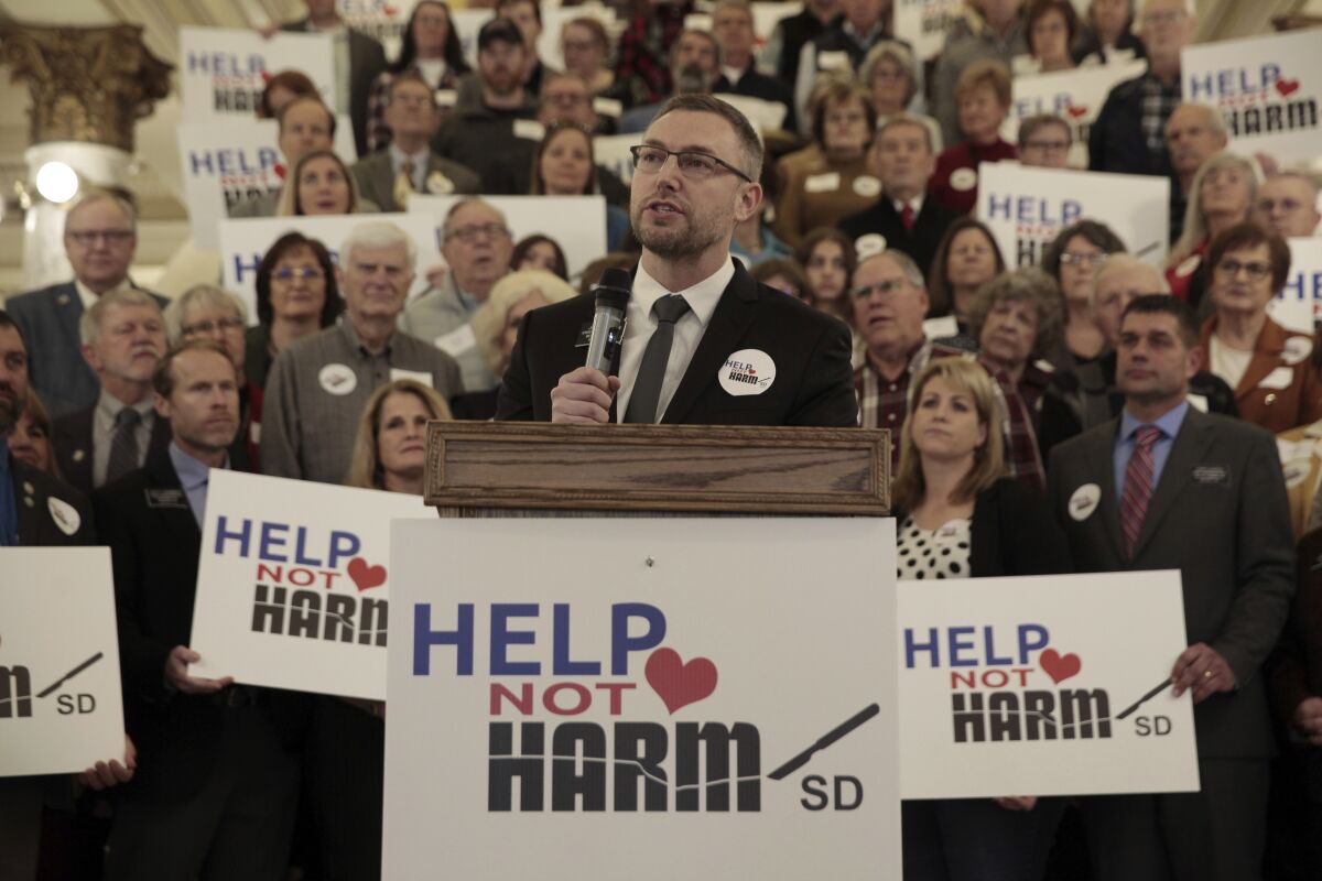 South Dakota Republican Rep. Jon Hansen speaks during a news conference at the state Capitol, Tuesday, Jan. 17, 2023, in Pierre, S.D. Hansen is pushing a bill to outlaw gender-affirming health care for transgender youth. (AP Photo/Stephen Groves)