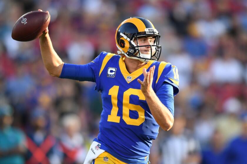 LOS ANGELES, SEPTEMBER 27, 2018-Rams quarterback Jared Goff throws a pass against the Vikings in the 1st quarter at the Coliseum Thursday. (Wally Skalij/Los Angeles Times)