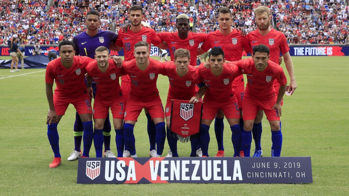 The U.S. men's national team poses for a photo before an international friendly match against Venezuela in Cincinnati on June 9.