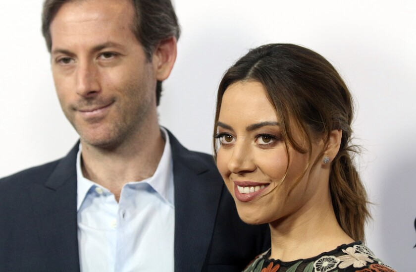 FILE - In this Monday, June 19, 2017,, file photo, Aubrey Plaza, right, and Jeff Baena arrive at the premiere of "The Little Hours" at the 2017 Los Angeles Film Festival in Culver City, Calif. Plaza has married her longtime boyfriend, director and screenwriter Baena. The “Parks and Recreation” actor called Baena “my husband” for the first time publicly Friday, May 7, 2021, in an Instagram post. (Photo by Willy Sanjuan/Invision/AP, File)