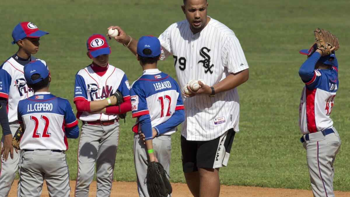 Cuban baseball defectors teach youth amid warming with US