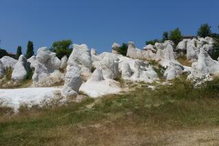 Aerial view of the natural landmark, called The Stone Wedding, located about 3 kilometers east of the town of Kardzhali, near the village of Zimzelen, some 260 km south-east from the Bulgarian capital Sofia. It is one of the most interesting rock formations in the eastern Rhodope mountain and it is a very popular tourist atraction for people from all around the world. The rock formations reach 10 meters in height and lie on an area of 40 dca. It was declared as a natural landmark by Bulgarian Government order in 1974. According to the scientific hypotheses the phenomen of The Stone Wedding started to forms 40 billion years ago, due to underwater volcanic activity, during the Paleocene, which formed the rock rhyolite tuffs. Later, after the sea receded, the rocks were exposed to rain, wind and sun, which formed them to their current shape. Various minerals in the (Photo by NurPhoto/NurPhoto via Getty Images)