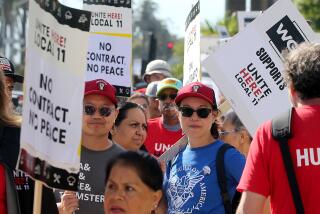 Santa Monica, CA - Members of Unite Here! Local 11 hotel workers union and members of the Writers Guild of America picket together outside the Fairmont Miramar Hotel in Santa Monica on Thursday, July 13, 2023. (Luis Sinco / Los Angeles Times)