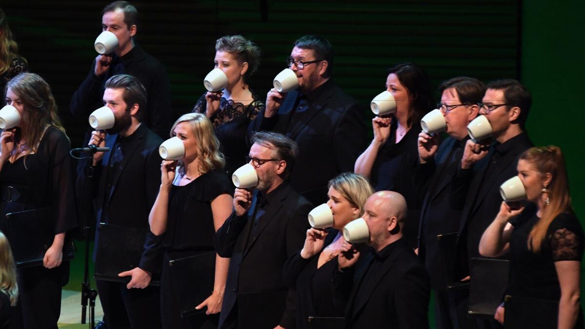 The choir sang into teacups at the Green Umbrella program at the L.A. Phil's Reykjavik Festival.