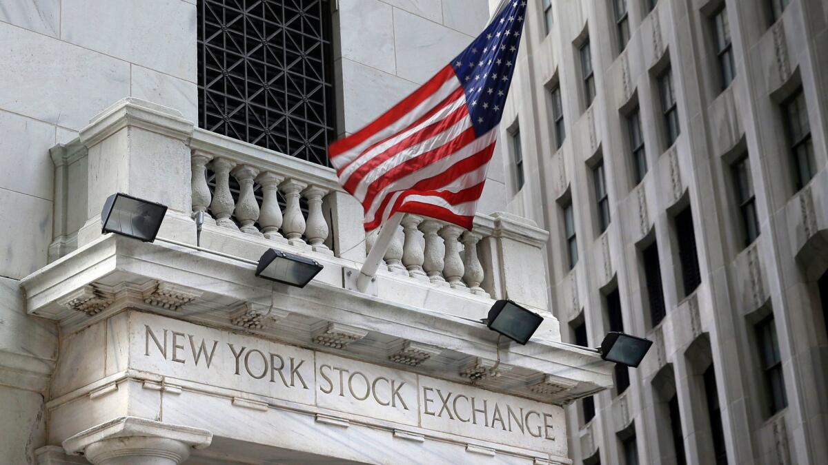 A flag flies from the New York Stock Exchange.