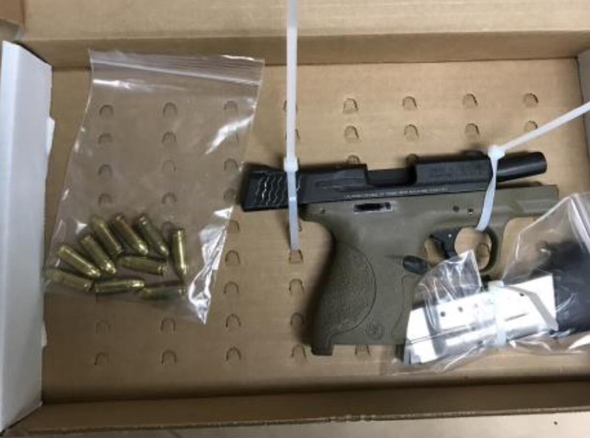 A loaded 9 mm handgun located at the illegal gambling establishment in Fountain Valley.