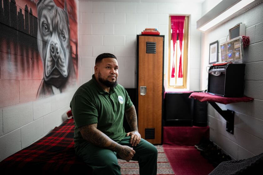 CHESTER, PA - MARCH 09: Inmate Luis A, known as "Honolulu," sits on the bed of his cell in the Little Scandinavia unit at SCI Chester on Thursday, March 9, 2023 in Chester, PA. The unit is designed to give prisoners a sense of autonomy over their space.
