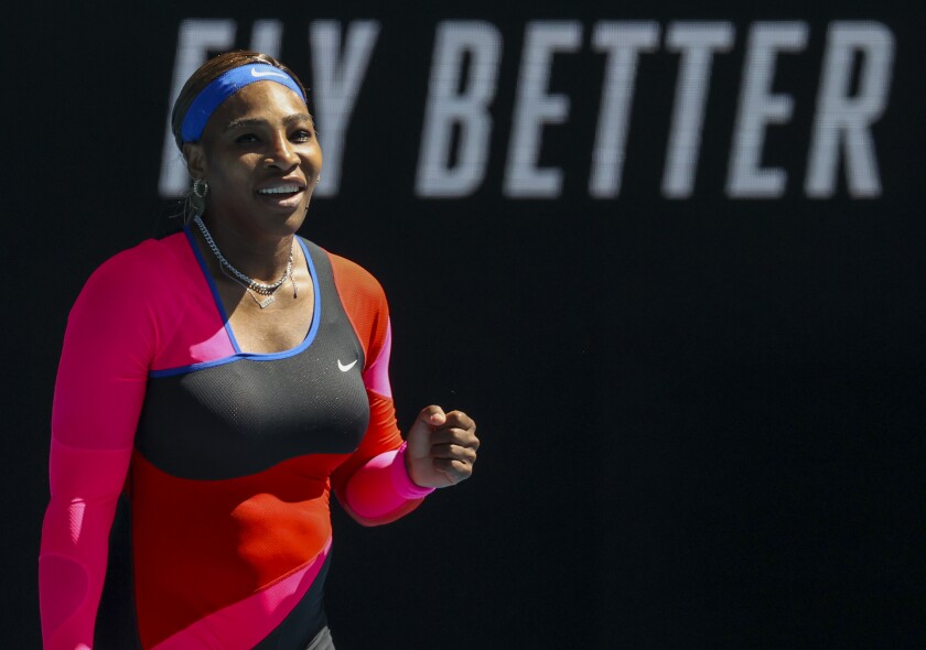 Serena Williams celebrates after winning her fourth-round match against Aryna Sabalenka on Feb. 14, 2021.
