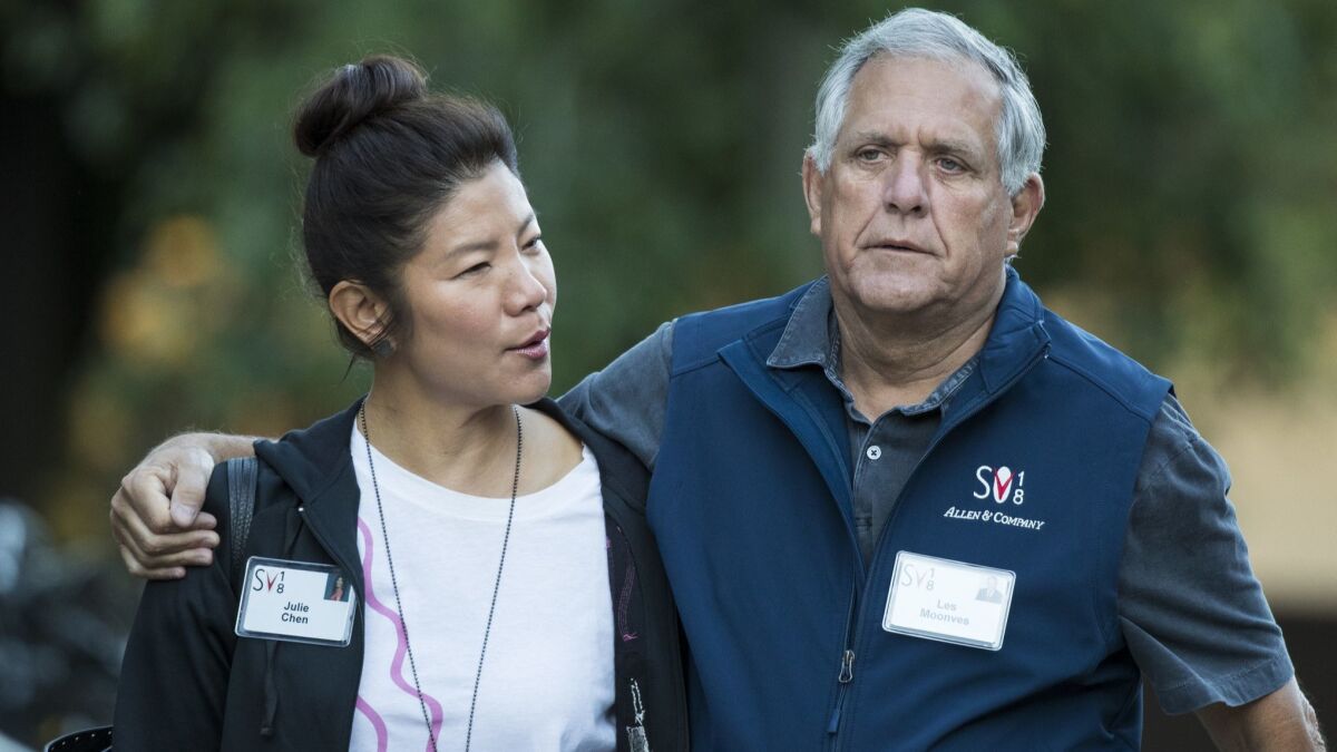 CBS Chief Executive Leslie Moonves walks with his wife, CBS television personality Julie Chen, in Sun Valley, Idaho on July 11.