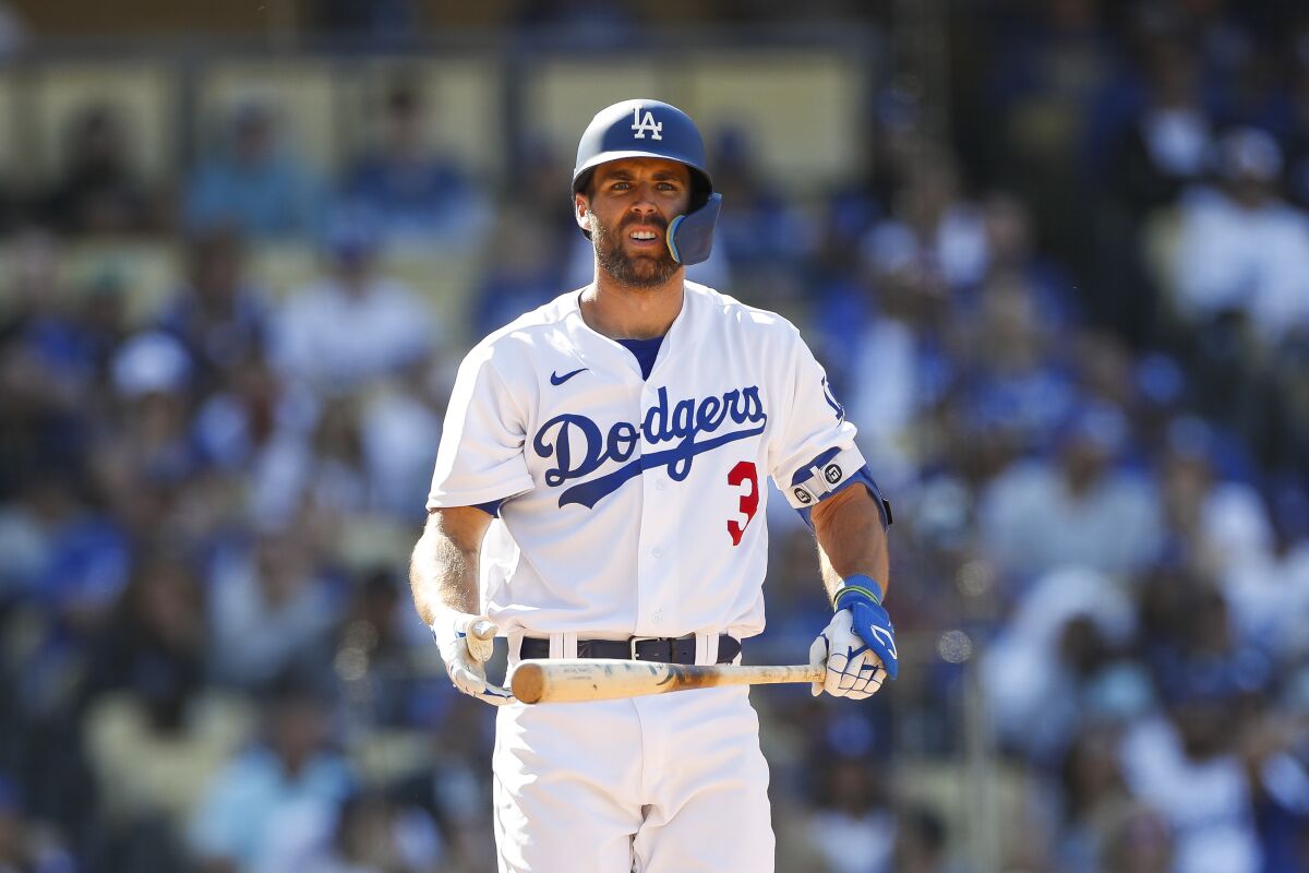 Chris Taylor strikes out in the ninth inning of the Dodgers' 2-1 loss to the Arizona Diamondbacks on Sunday.