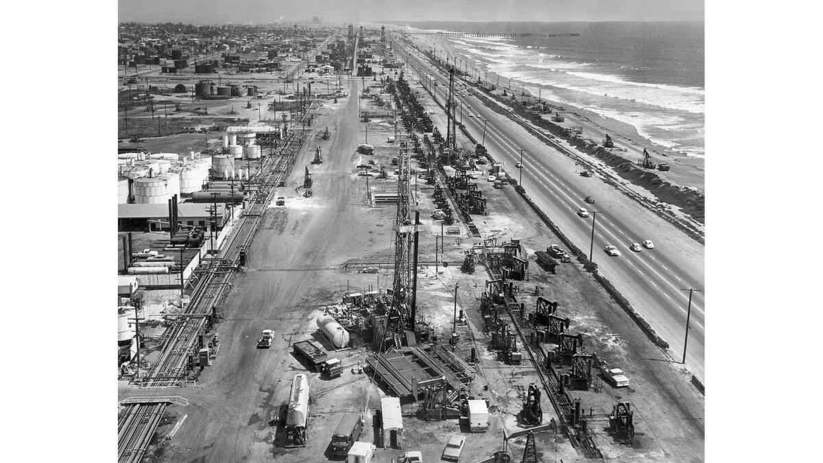 Aug. 2, 1966: Signal Oil production rigs line Pacific Coast Highway for about a mile between Huntington Beach and Seal Beach.