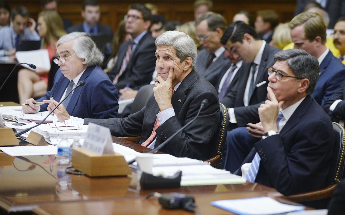 Secretary of State John Kerry, Secretary of Energy Dr. Ernest Moniz (left) and Secretary of the Treasury Jacob Lew (right) appear at a hearing before the House Foreign Affairs Committee on July 28. The committee is reviewing the proposed Iran nuclear agreement.