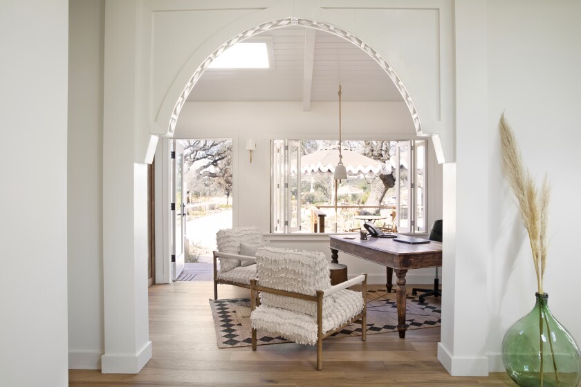 The all-white lobby at Hotel Ynez in Solvang, Calif.