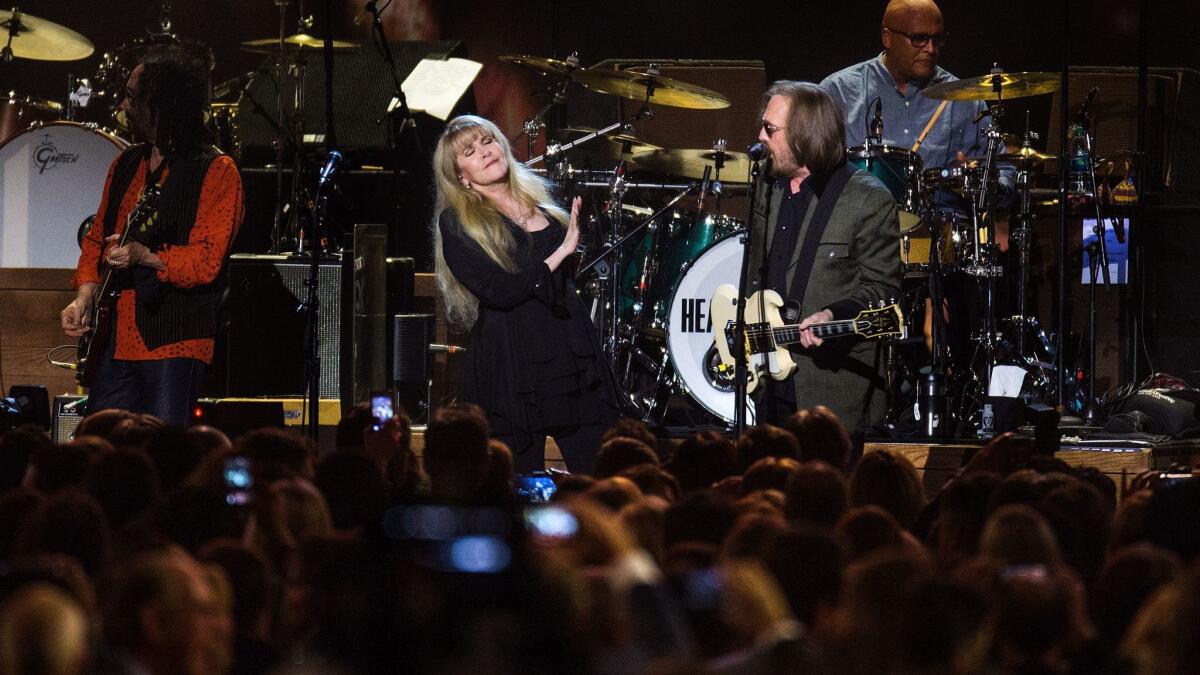 Tom Petty singing a duet with Stevie Nicks at the Los Angeles Convention Center on Feb. 10, 2017.