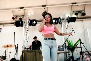 Rapper Gucci Mar, a Santa Ana native, performs her 2019 single "Pretty" at the East End Block Party festival in Santa Ana in 2019. (Credit: Eduardo Ponce)