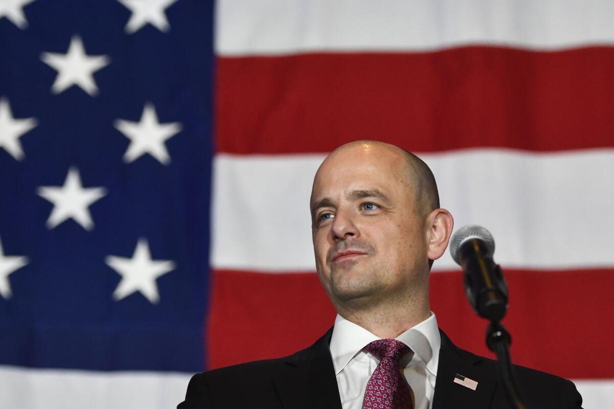 Independent Evan McMullin speaks to supporters during an election-night event on Tuesday, Nov. 8, 2022, in Taylorsville, Utah. McMullin is trying to unseat incumbent U.S. Sen. Mike Lee, a Republican, in the Nov. 8, 2022 election. (AP Photo/Alex Goodlett)