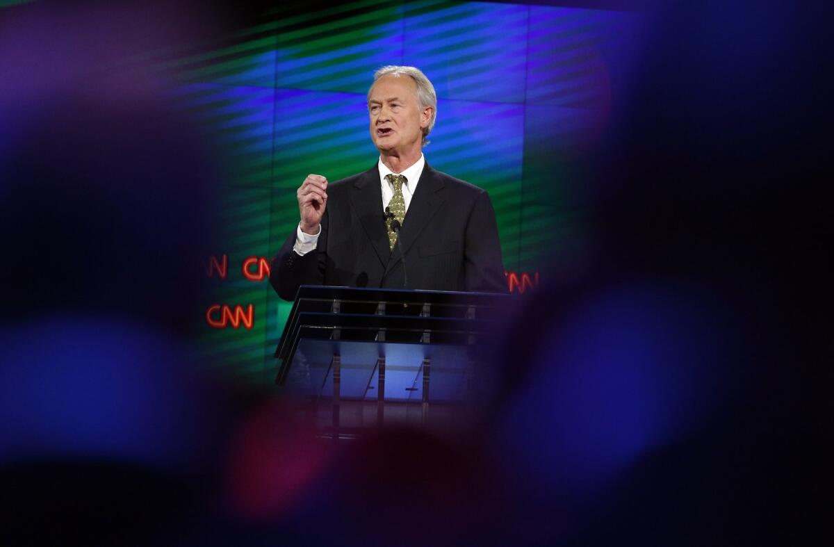 ** CORRECTS FROM JIM WEBB TO LINCOLN CHAFEE ** Former Rhode Island Gov. Lincoln Chafee speaks during the CNN Democratic presidential debate Tuesday, Oct. 13, 2015, in Las Vegas. (AP Photo/John Locher)