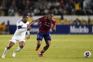 LA Galaxy forward Douglas Costa, left, and Real Salt Lake midfielder Nelson Palacio.