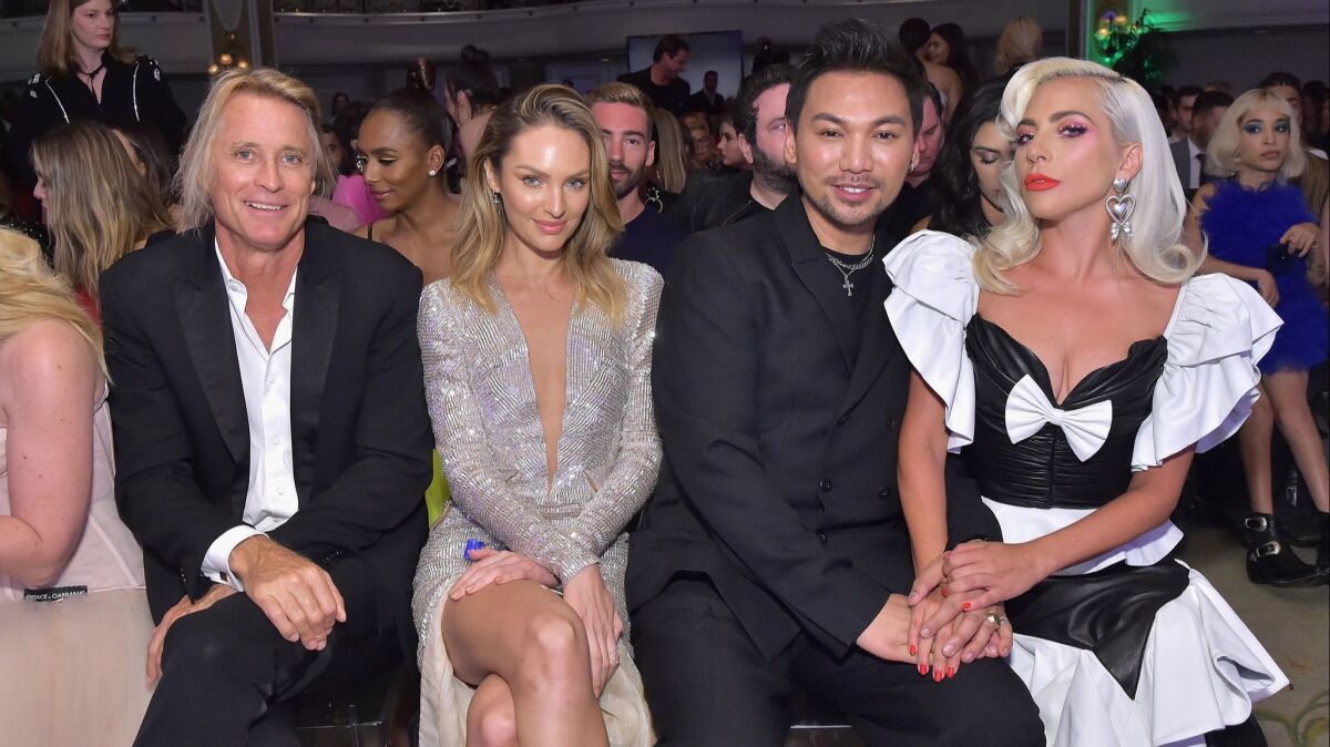 Russell James, left, Candice Swanepoel, Frederic Aspiras and Lady Gaga attend the Daily Front Row Fashion Los Angeles Awards on Sunday.