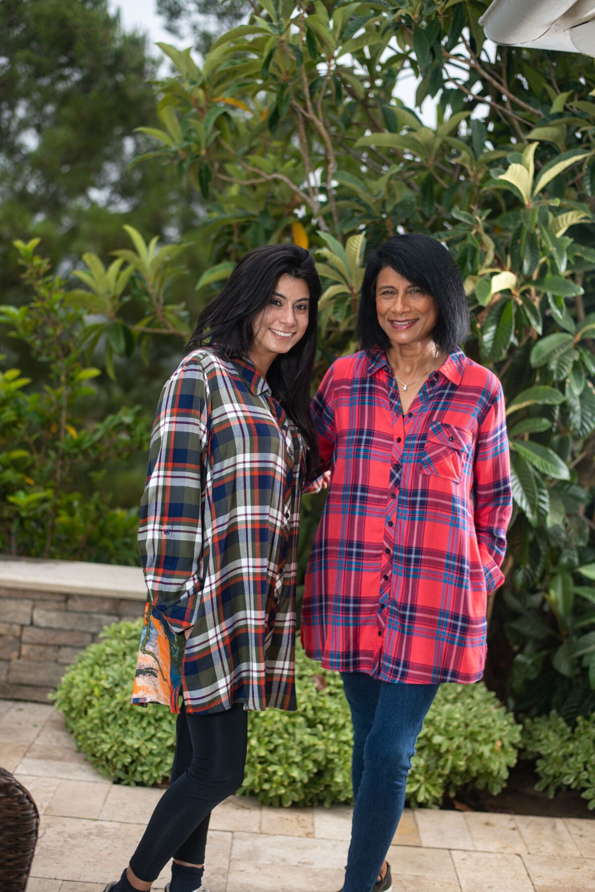 Mother-daughter team: Alka and Aishya wearing Tolani plaids.