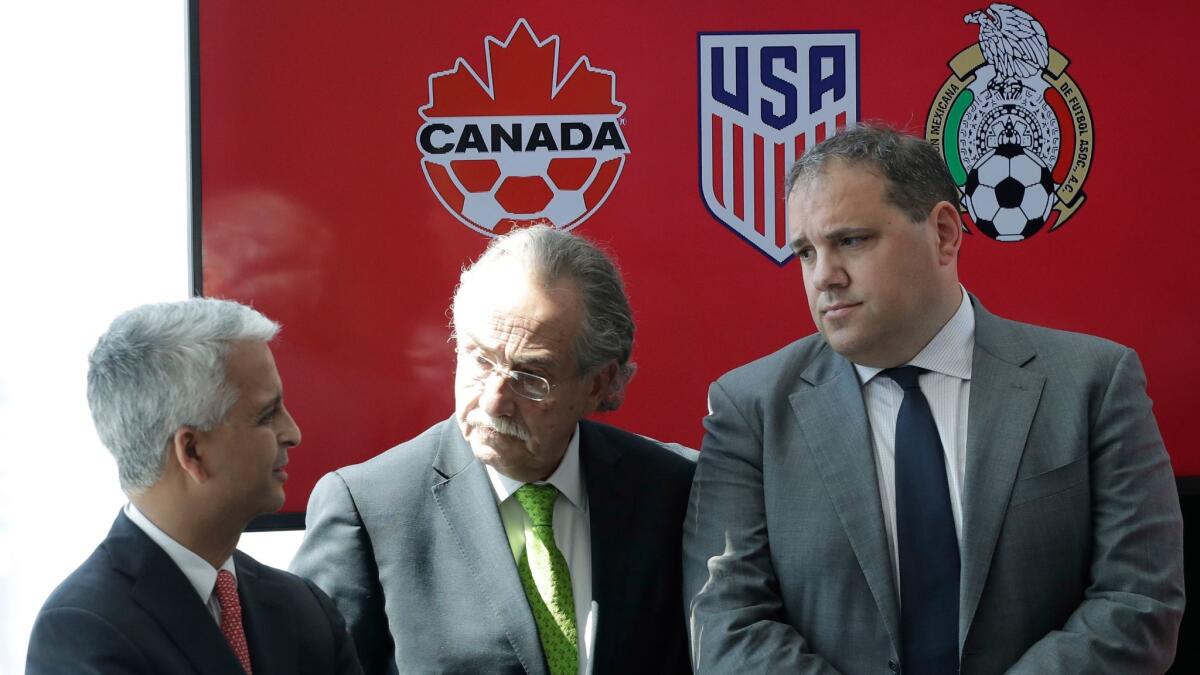 Sunil Gulati, left, President of the United States Soccer Federation, Decio de Maria, center, President of the Mexican Football Federation, and Victor Montagliani, President of the Canadian Soccer Association, hold a news conference on April 10 in New York