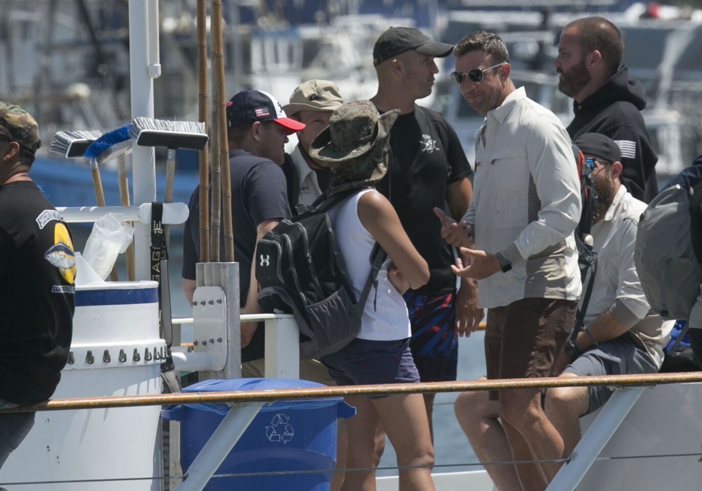 Congressman Duncan D. Hunter, spoke to other passengers before leaving the fishing boat "Dolphin" as it docked in San Diego after returning from a Rivers of Recovery Fishing Tournament for Wounded Combat Veterans fundraiser.