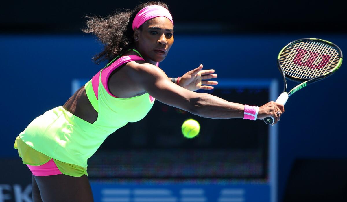 Serena Williams reaches to hit a backhand during her win over Vera Zvonareva on Thursday at the Australian Open.