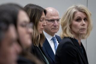 Dr. Caitlin Bernard, left, sits between attorneys John Hoover and Alice Morical on Thursday, May 25, 2023, before a hearing in front of the state medical board at the Indiana Government South building in downtown Indianapolis. Bernard is appearing before the board for the final hearing in a complaint filed by Attorney General Todd Rokita saying she violated patient privacy laws and reporting laws. (Mykal McEldowney/The Indianapolis Star via AP)