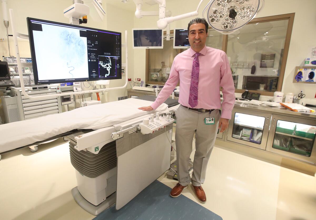 Dr. Hamed Farid in the new neurointerventional angiography suite at Fountain Valley Regional Hospital on Tuesday.