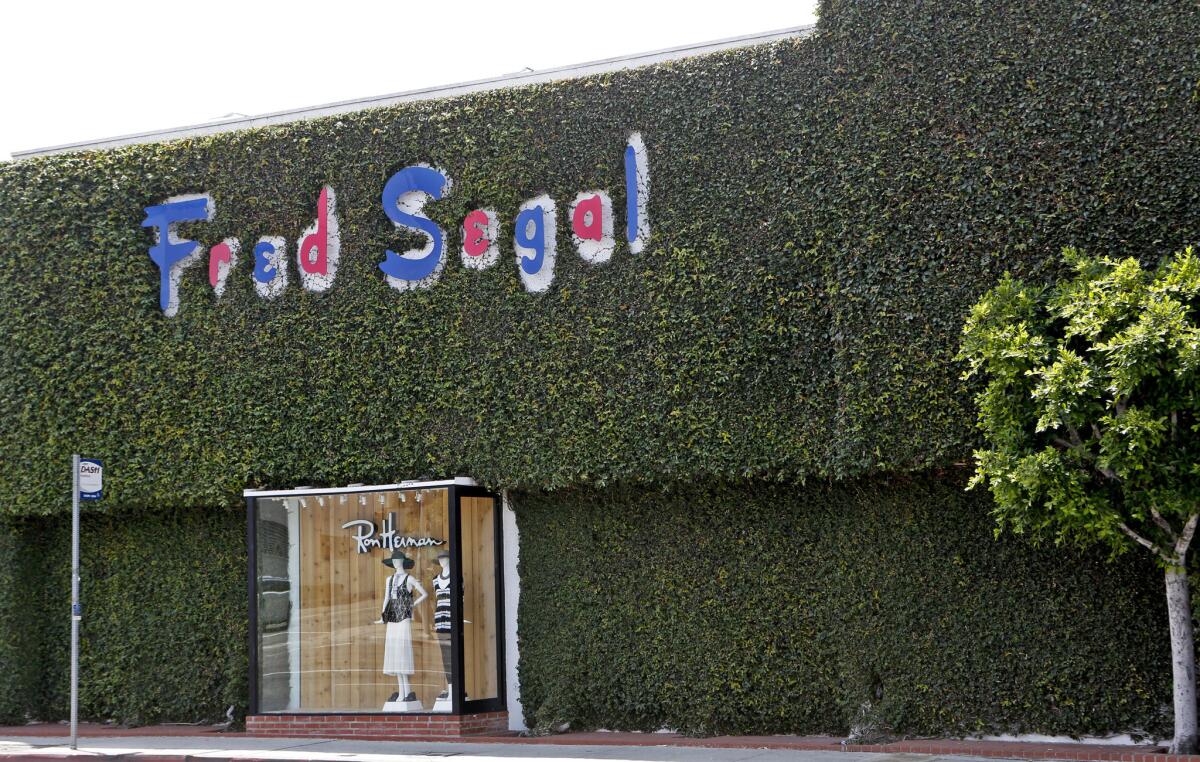 The iconic ivy-covered exterior of the Fred Segal center at 8100 Melrose Avenue in a July 2014 file photo. On March 11, 2016, the poperty was sold to a Canadian retail real estaste investment company for a reported $43 million/