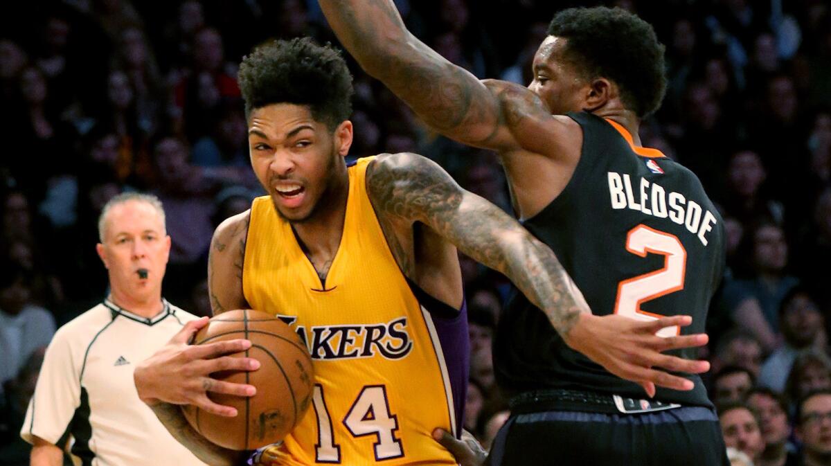 Lakers rookie Brandon Ingram drives to the basket against Suns guard Eric Bledsoe during a game at Staples Center on Dec. 9.