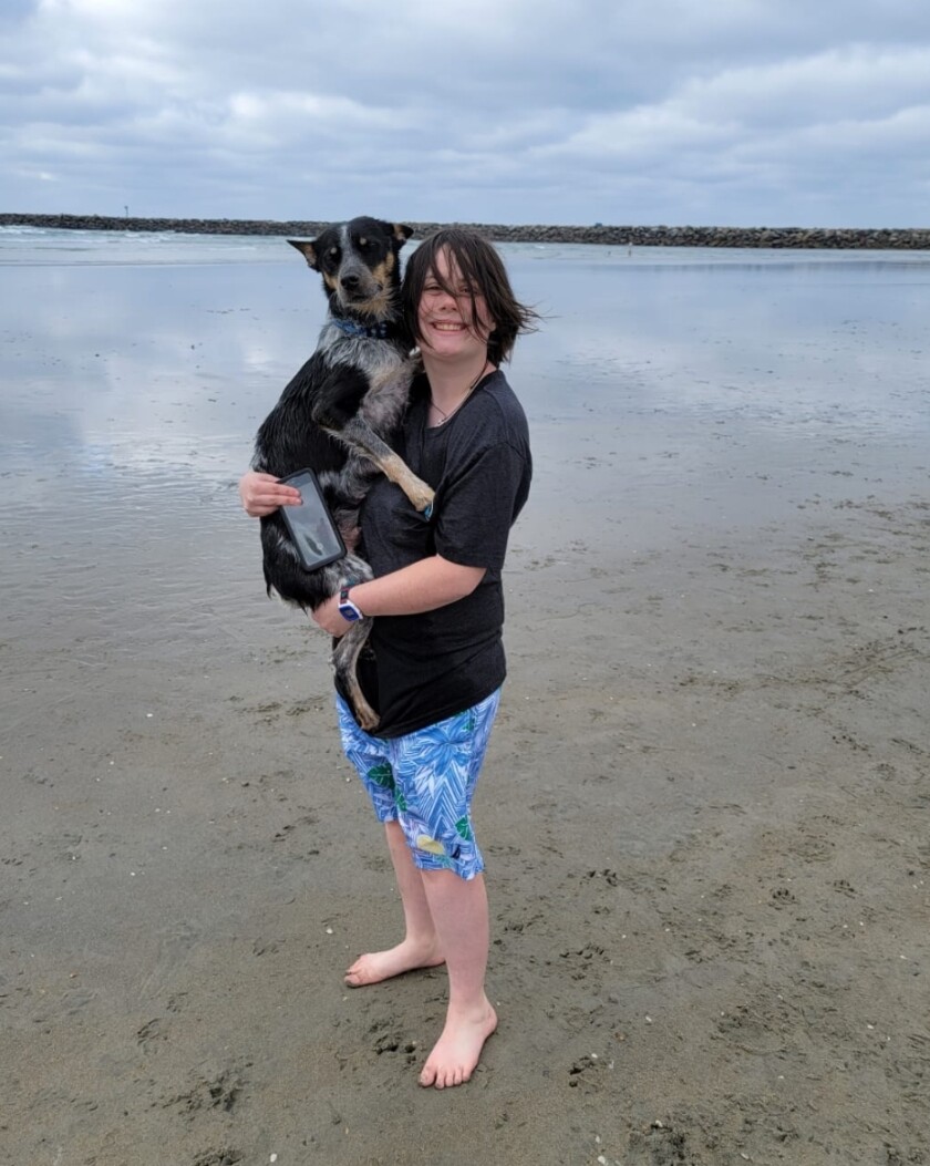 Teresa Perry, who loves to take Meeka to Ocean Beach's Dog Beach on their days off, says Meeka is her hero.