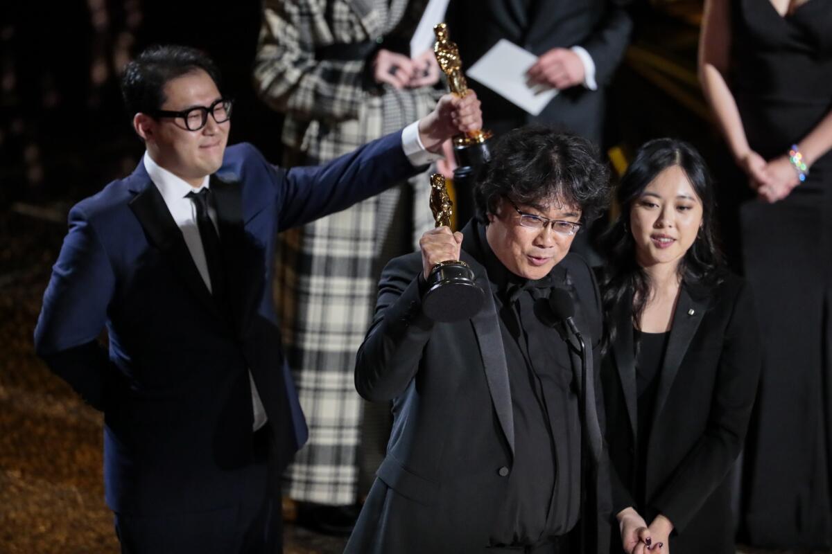 Bong Joon Ho and Han Jin Won, winners of the original screenplay Oscar for “Parasite”during the telecast of the 92nd Academy Awards.