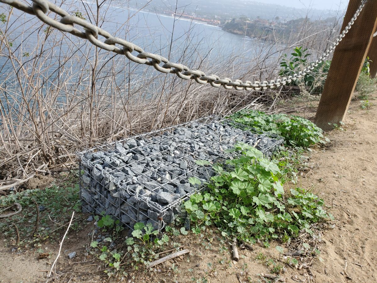 Gabions are installed along Coast Walk Trail to help control erosion.