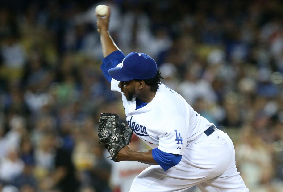 Dodgers reliever Pedro Baez throws a pitch against the Dimaondbacks at Dodger Stadium earlier this month.