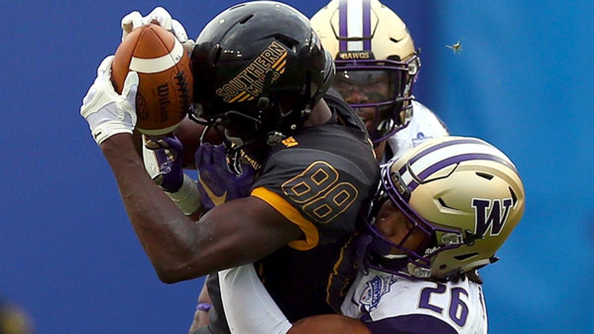 Southern Mississippi receiver Michael Thomas (88) makes a catch against Washington in the Heart of Dallas Bowl on Dec. 26, 2015.