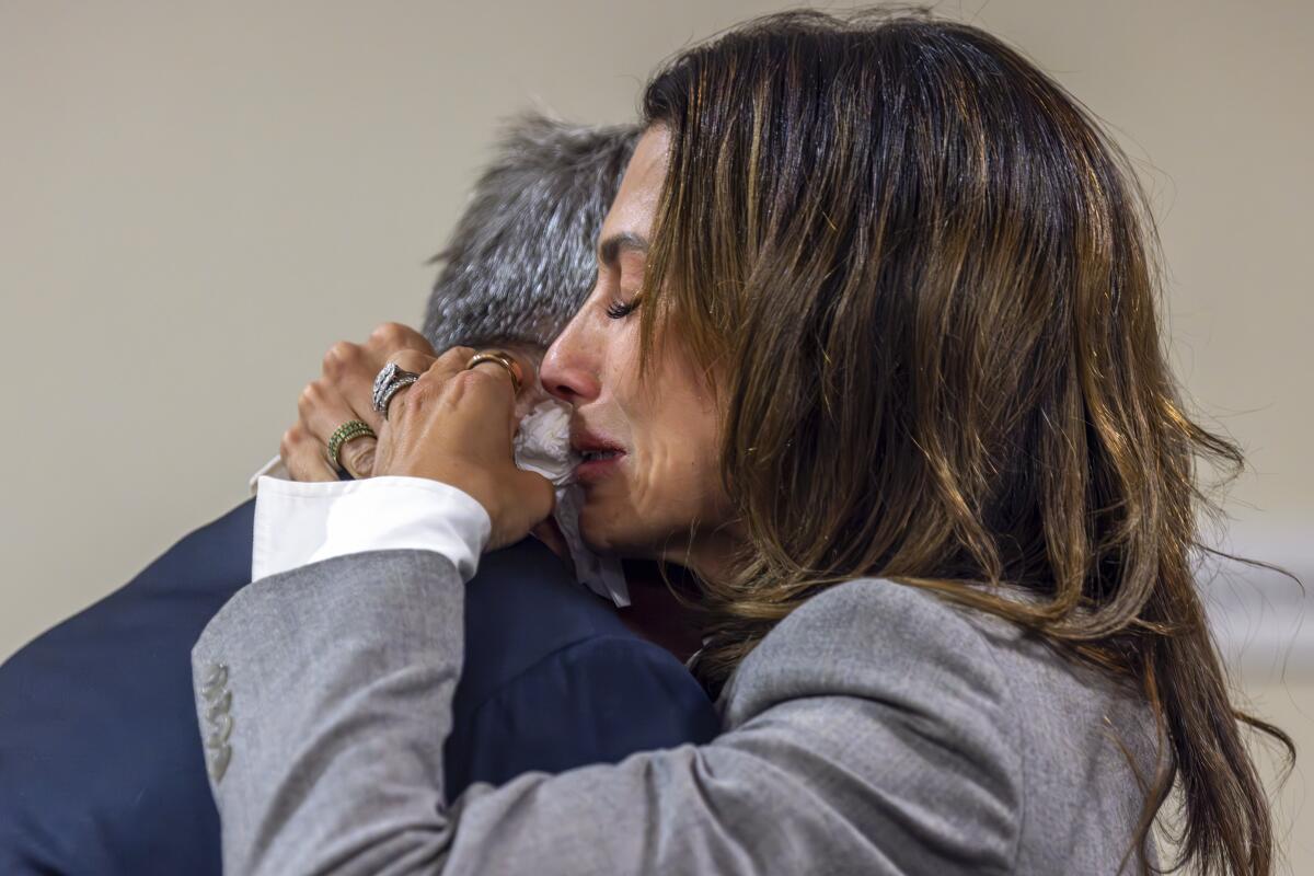 Actor Alec Baldwin and his wife, Hilaria Baldwin, hug 