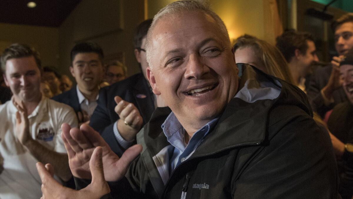 Denver Riggleman celebrates his election victory with supporters on Nov. 6.