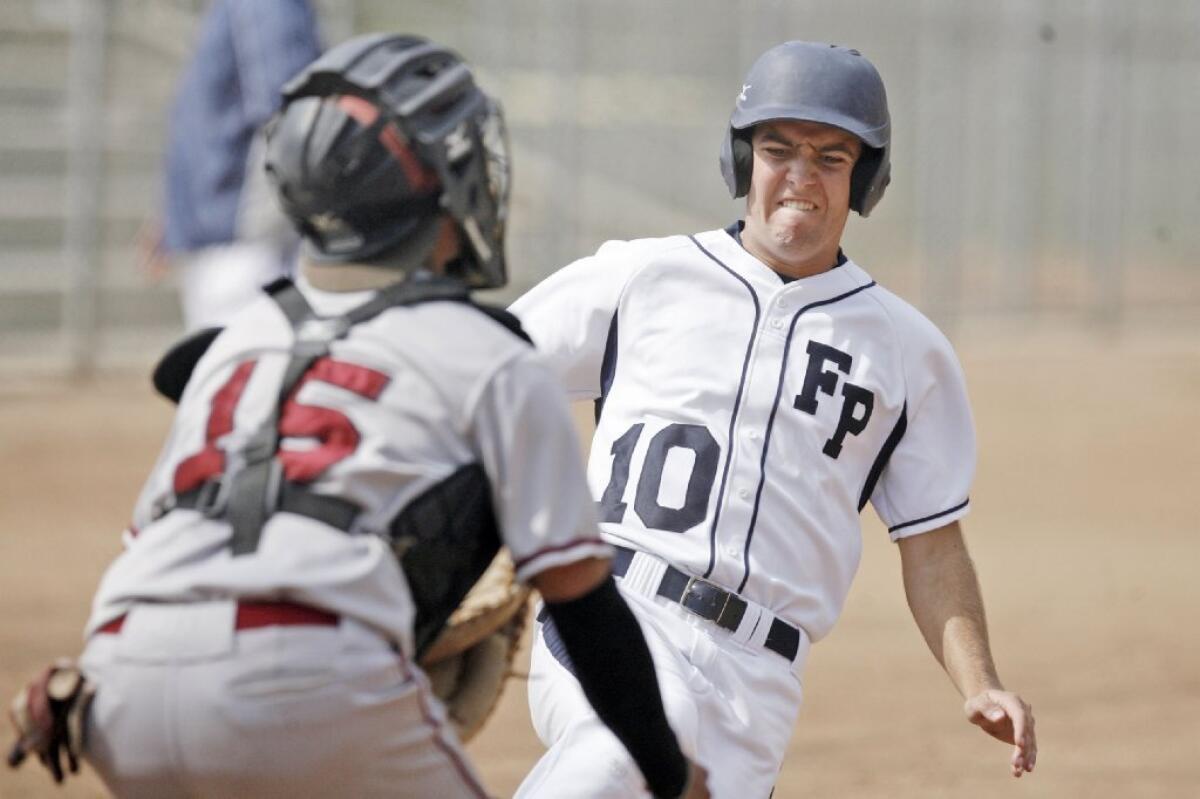 Flintridge Prep's Clayton Weirick, right, comes home in a 14-6 win over Santa Paula in the CIF Southern Section Division VI playoffs. It's the Rebels first playoff win since 1999.