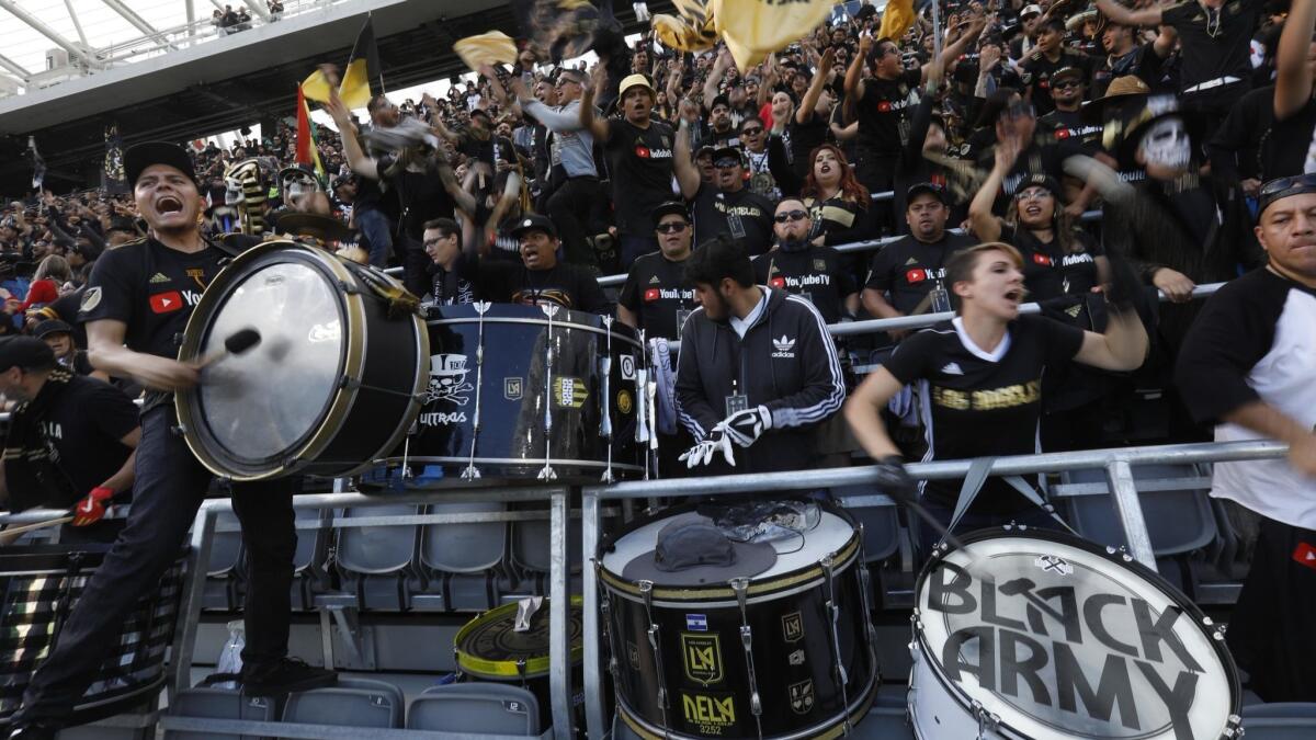 Fans chant before the match at the brand new Banc of California stadium.