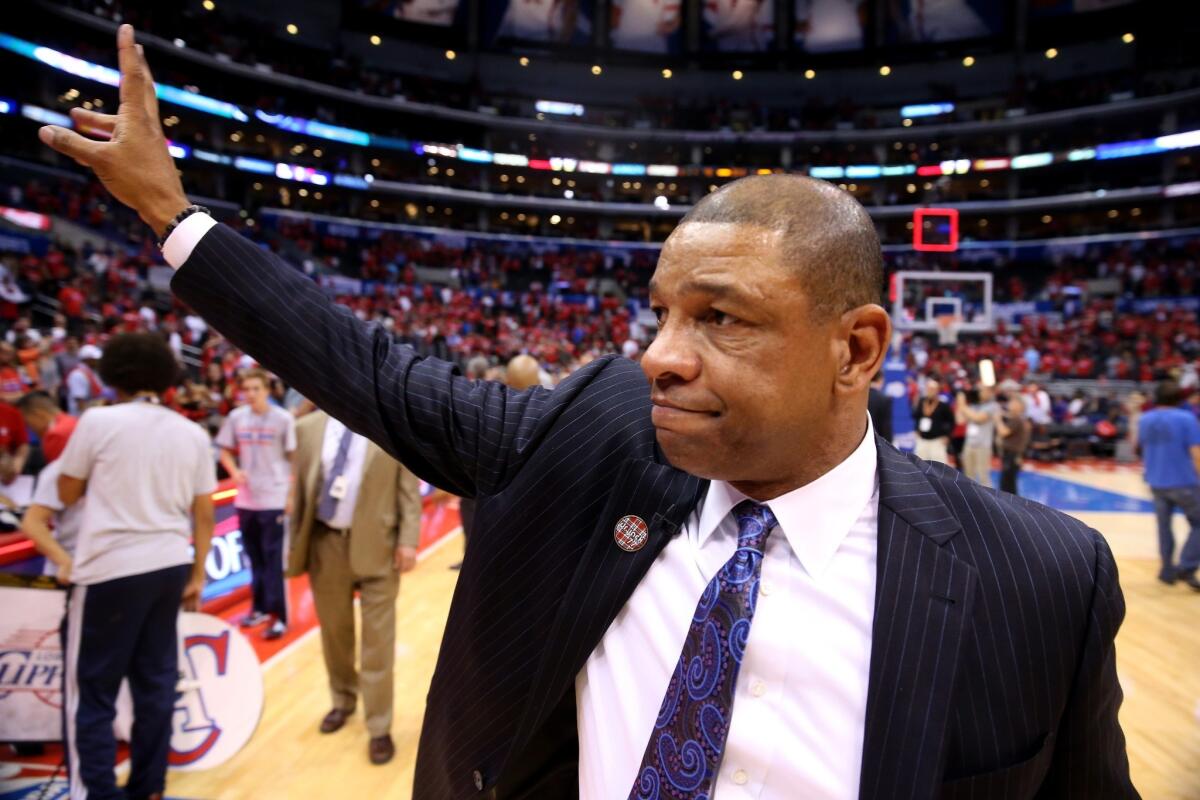 Clippers Coach Doc Rivers, who also had been senior vice president of basketball operations, will now serve as president of basketball operations in a staff restructuring announced Monday.