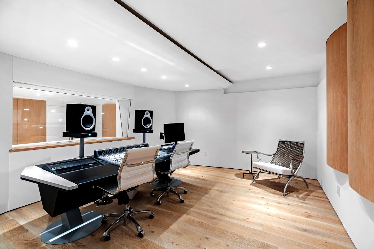 A two-room recording studio lies beneath the home, where there's also a subterranean garage.
