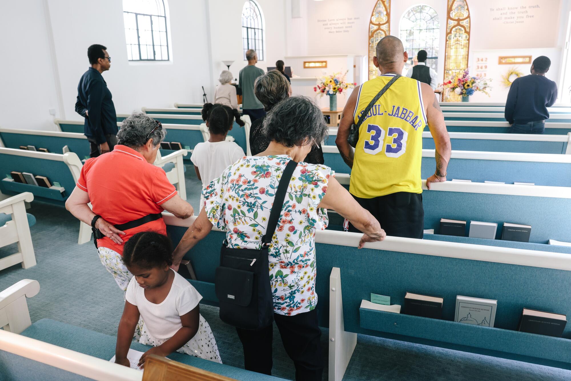 Churchgoers attend a service inside a chapel