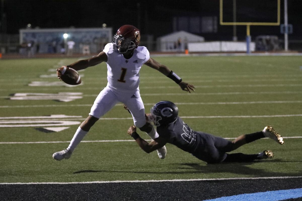 Oxnard quarterback Jaden Jones in an early season game against Camarillo. Jones rushed for 142 yards on Friday night in a win over Pacifica.