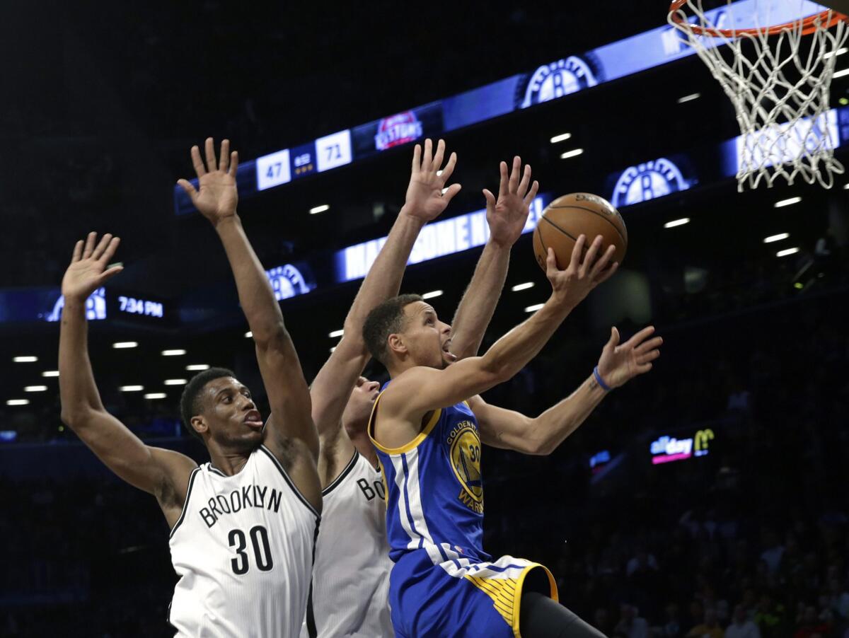 Stephen Curry and the Warriors drove past the Nets for win No. 22.